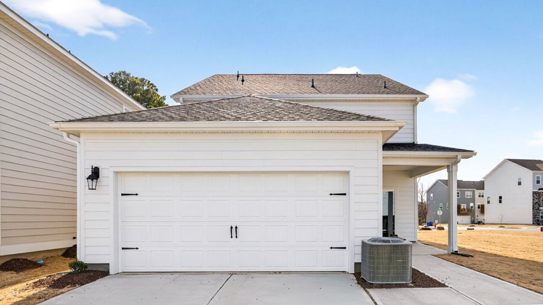 Representative exterior photo of a completed home built from the Calhoun by D.R. Horton in Madden West, Fuquay Varina, NC (Image 24).