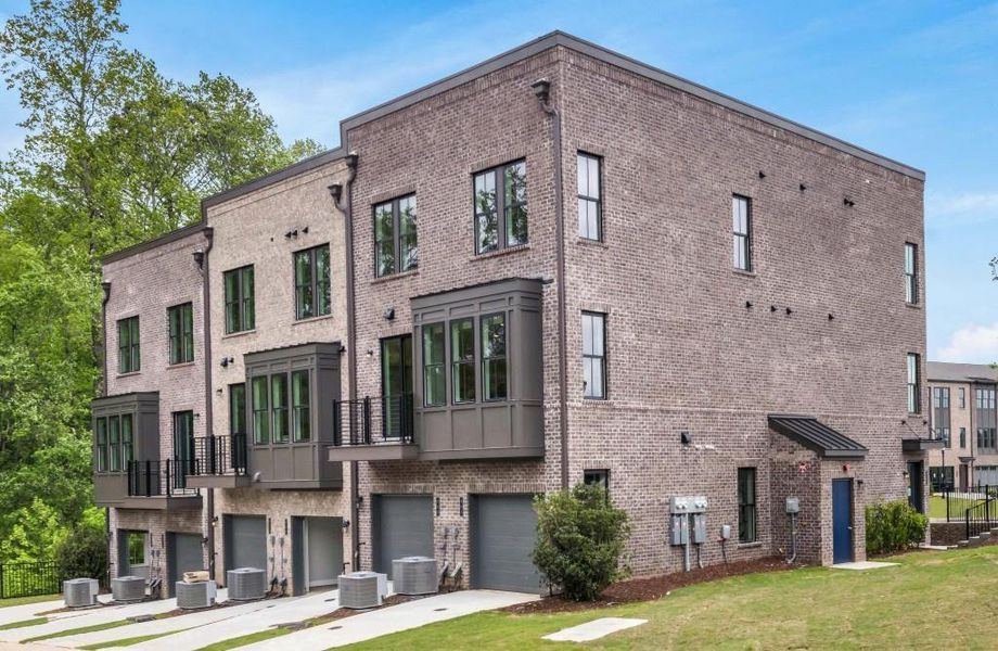 Front exterior of a new home in Echo Park, Suwanee, GA, highlighting curb appeal (Image 19).
