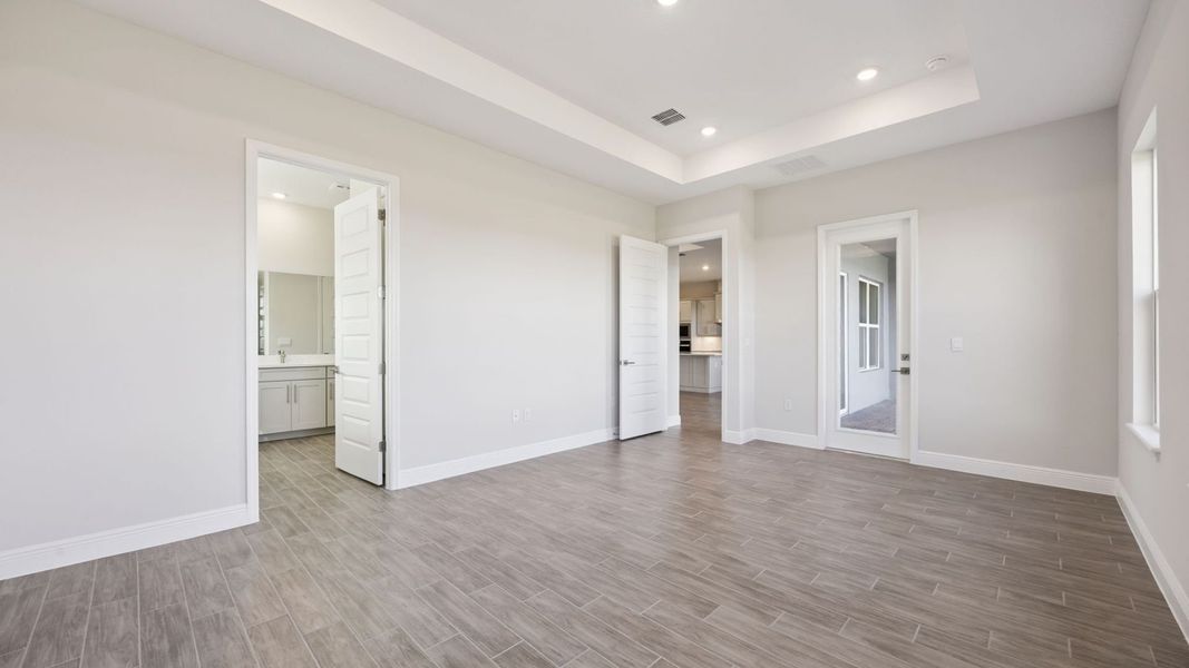 Representative unfurnished interior of a home built from the Everett by D.R. Horton in Buena Lago, St. Cloud (Image 22).