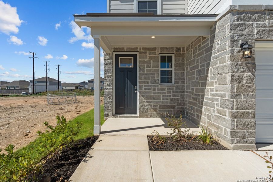 Front exterior of a new home in Talley Fields, San Antonio, TX, highlighting curb appeal (Image 16). Front exterior of a new home in Talley Fields, San Antonio, TX, highlighting curb appeal (Image 16).