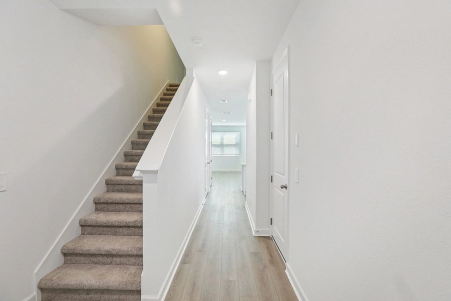 Front entry opens up into bright and airy foyer
