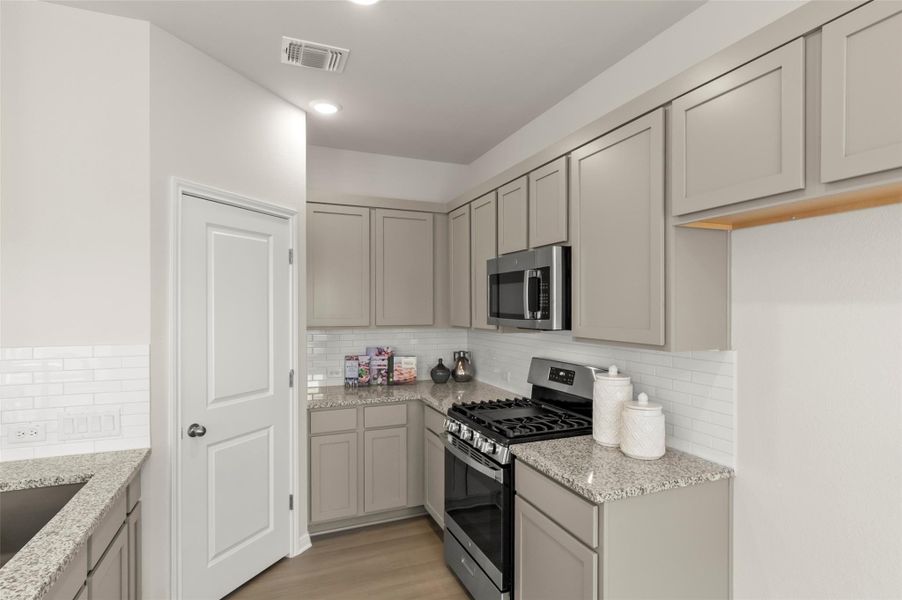 Furnished interior view inside a new home in Blanco Vista, San Marcos (Image 13).