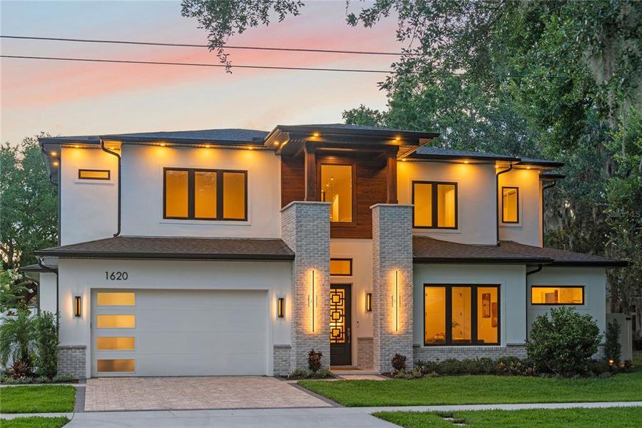 Front exterior of a new home in , Orlando, FL, highlighting curb appeal (Image 37). Front exterior of a new home in , Orlando, FL, highlighting curb appeal (Image 37).