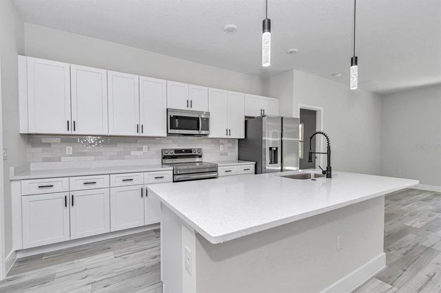 Furnished interior view inside a new home in , Poinciana (Image 7). Furnished interior view inside a new home in , Poinciana (Image 7).