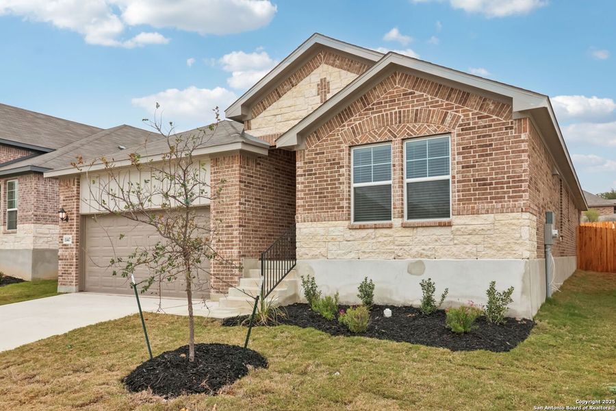 Front exterior of a new home in , San Antonio, TX, highlighting curb appeal (Image 22). Front exterior of a new home in , San Antonio, TX, highlighting curb appeal (Image 22).
