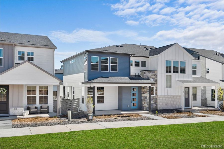 Front exterior of a new home in , Littleton, CO, highlighting curb appeal (Image 2).