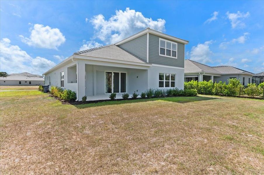 Exterior details and patio area of a home in , Sarasota (Image 3).