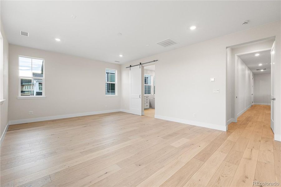 Spacious, unfurnished interior of a new home in Luxe at The Canyons, Castle Pines (Image 44).