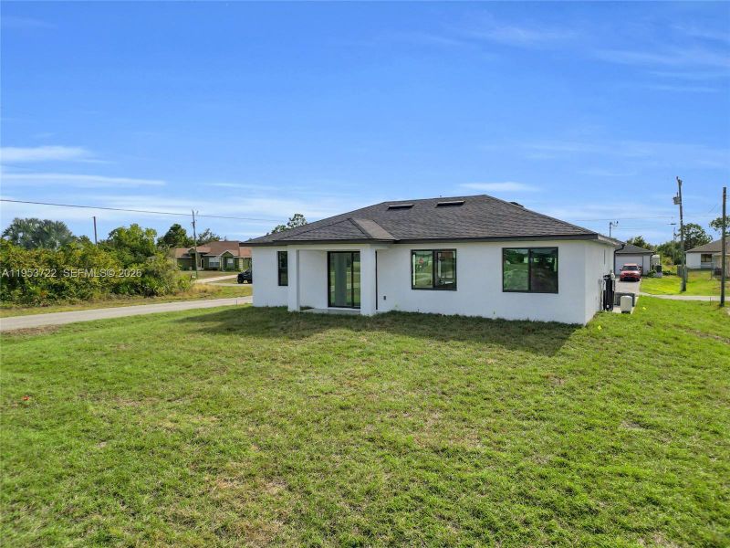 Exterior details and patio area of a home in , Lehigh Acres (Image 4). Exterior details and patio area of a home in , Lehigh Acres (Image 4).