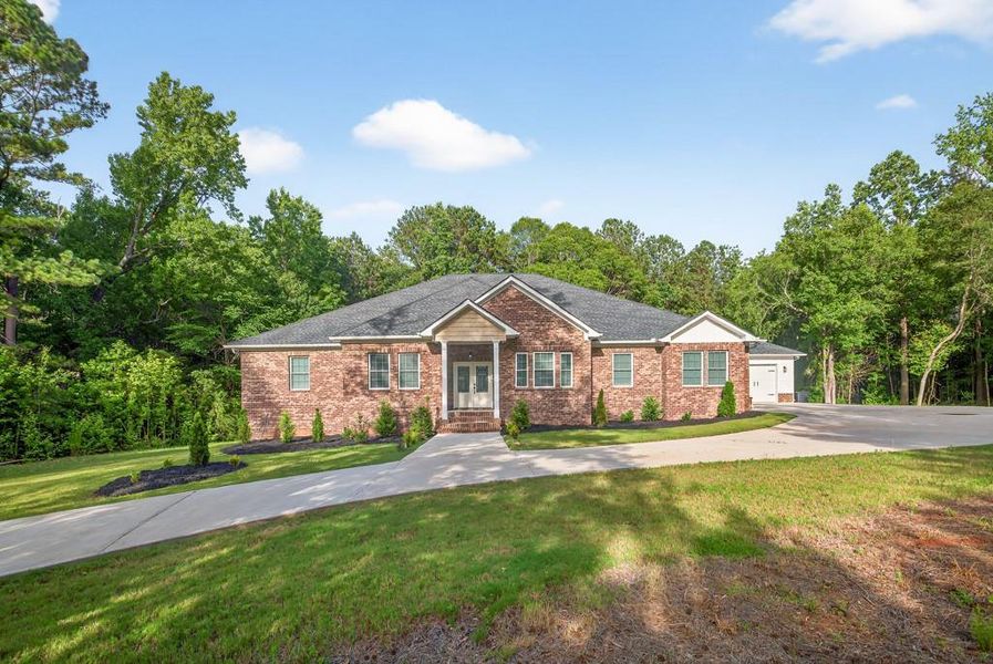 Front exterior of a new home in , Oxford, GA, highlighting curb appeal (Image 33). Front exterior of a new home in , Oxford, GA, highlighting curb appeal (Image 33).