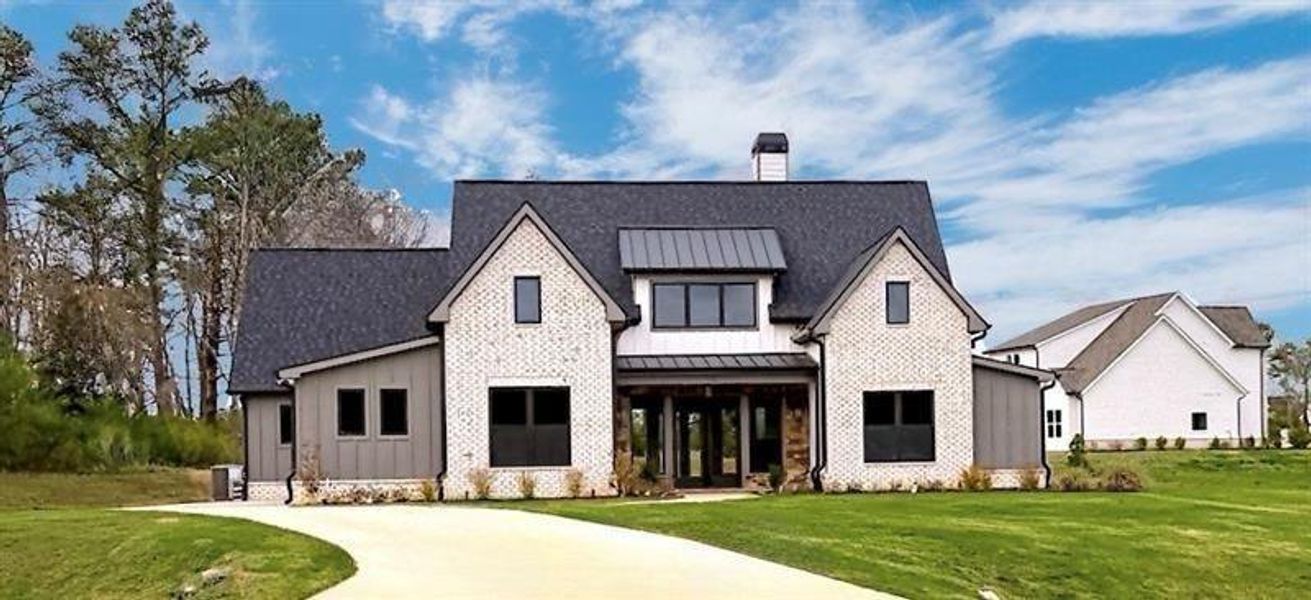 Front exterior of a new home in , Rydal, GA, highlighting curb appeal (Image 29).