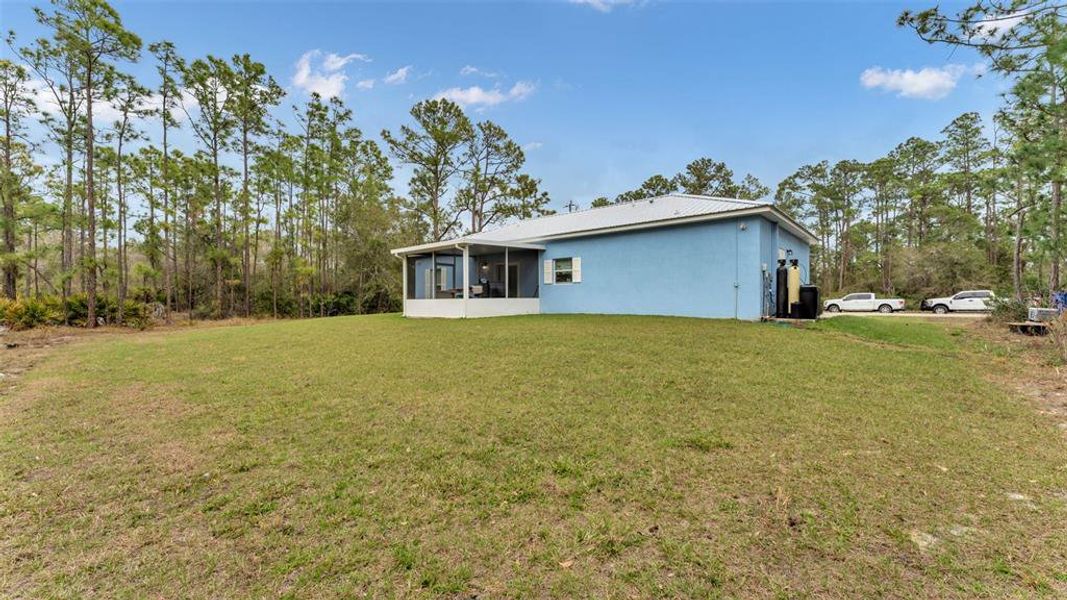 Exterior details and patio area of a home in , Sebring (Image 23).