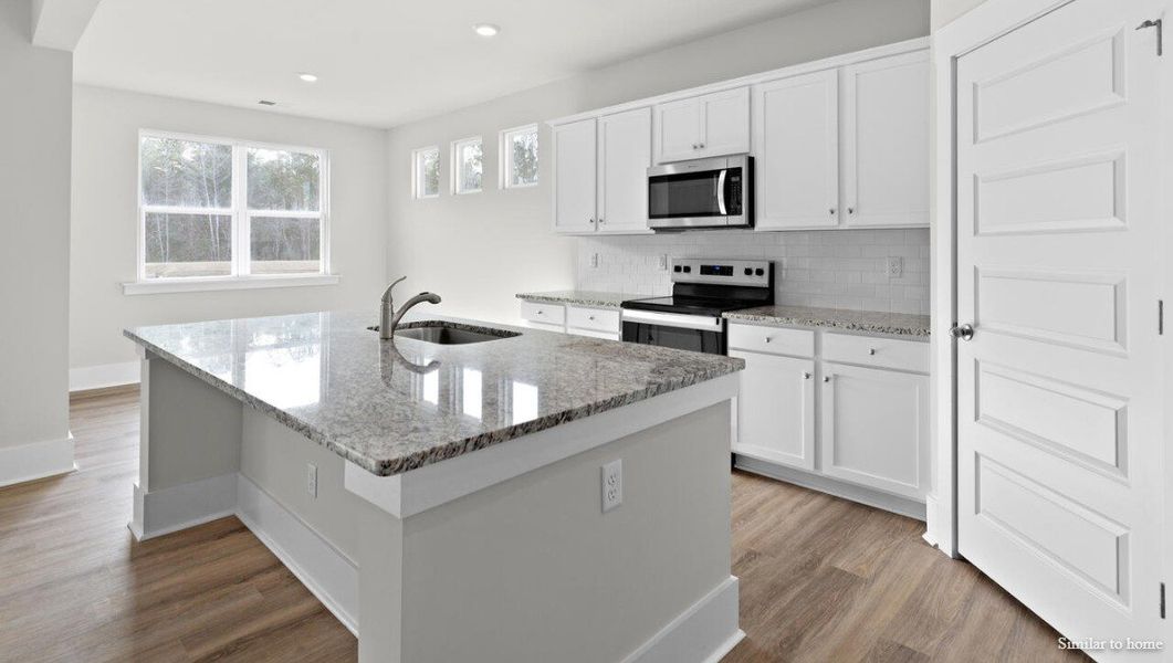 Furnished interior view inside a new home in Merchant Point, Jacksonville (Image 4). Furnished interior view inside a new home in Merchant Point, Jacksonville (Image 4).