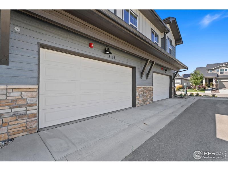 Exterior details and patio area of a home in The Lakes at Centerra - Discovery, Loveland (Image 21).