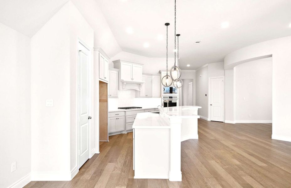 Furnished interior view inside a new home in Bridgeland 50′, Cypress (Image 7).