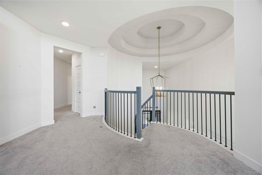 Dramatic open sightlines and soaring ceilings create an extraordinary sense of openness and luxury throughout the home.