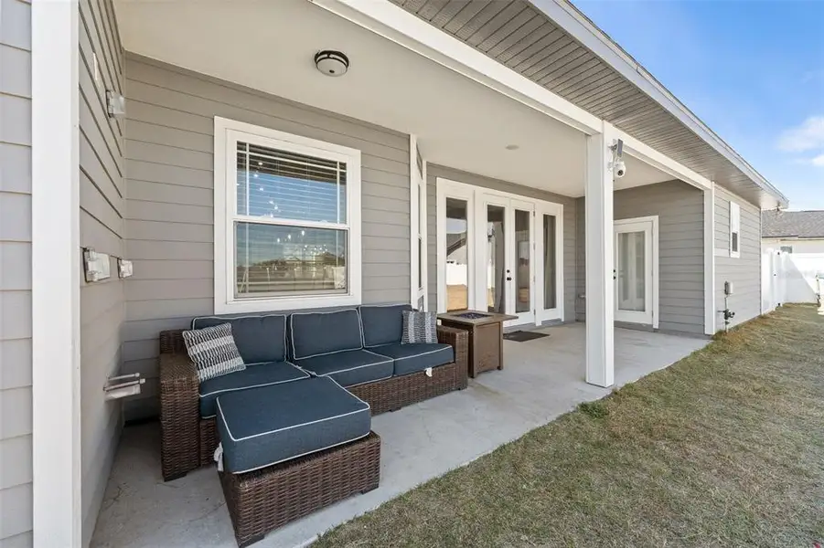 Exterior details and patio area of a home in , Newberry (Image 27).
