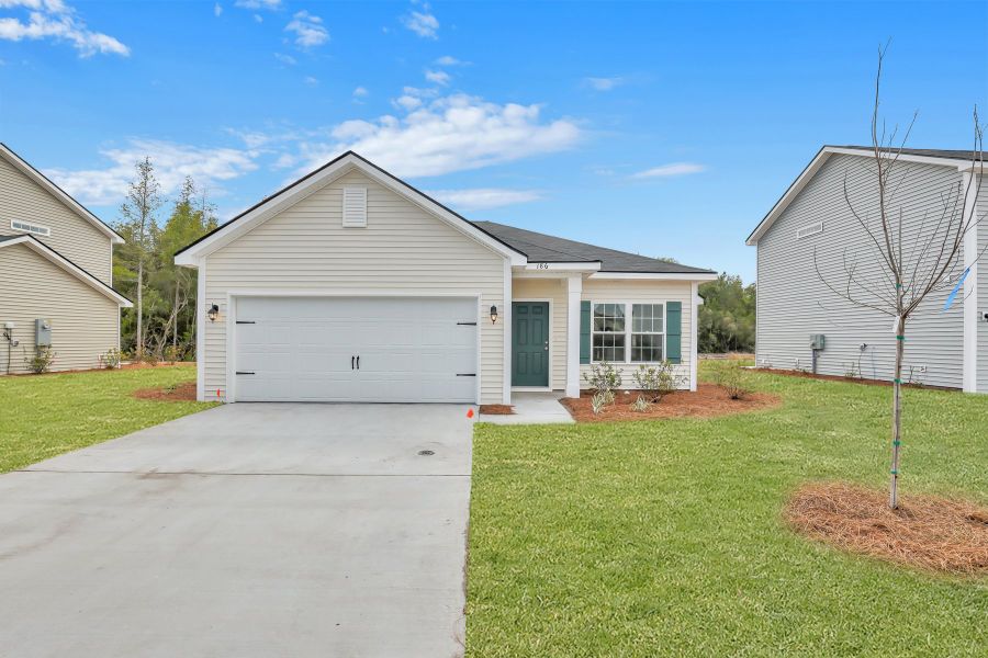 Representative exterior photo of a completed home built from the The Basswood by RTS Homes in Grand Reserve, Hinesville, GA (Image 2). Representative exterior photo of a completed home built from the The Basswood by RTS Homes in Grand Reserve, Hinesville, GA (Image 2).