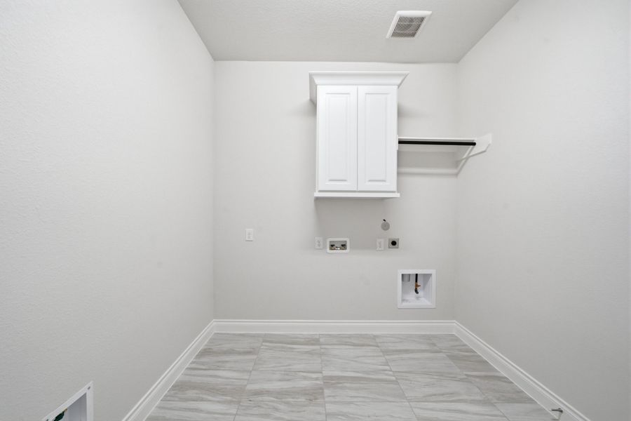 Spacious, unfurnished interior of a new home in The Woodlands Hills 65′, Willis (Image 35).