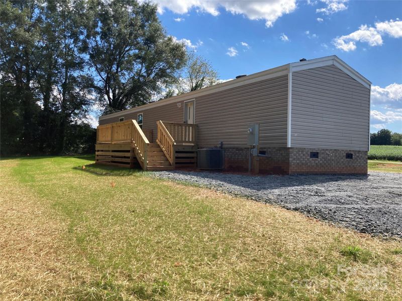 Front exterior of a new home in , Ellenboro, NC, highlighting curb appeal (Image 23).