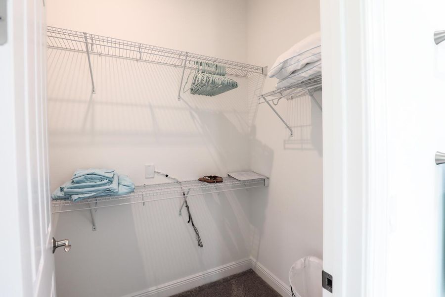 Furnished interior view inside a new home in PGA Village Verano, Port St. Lucie (Image 50).