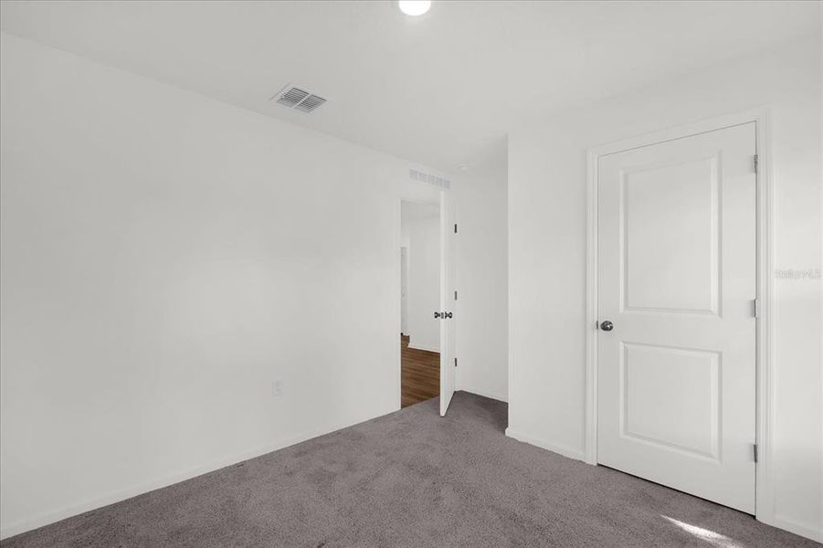 Spacious, unfurnished interior of a new home in Poinciana Village, Kissimmee (Image 21).