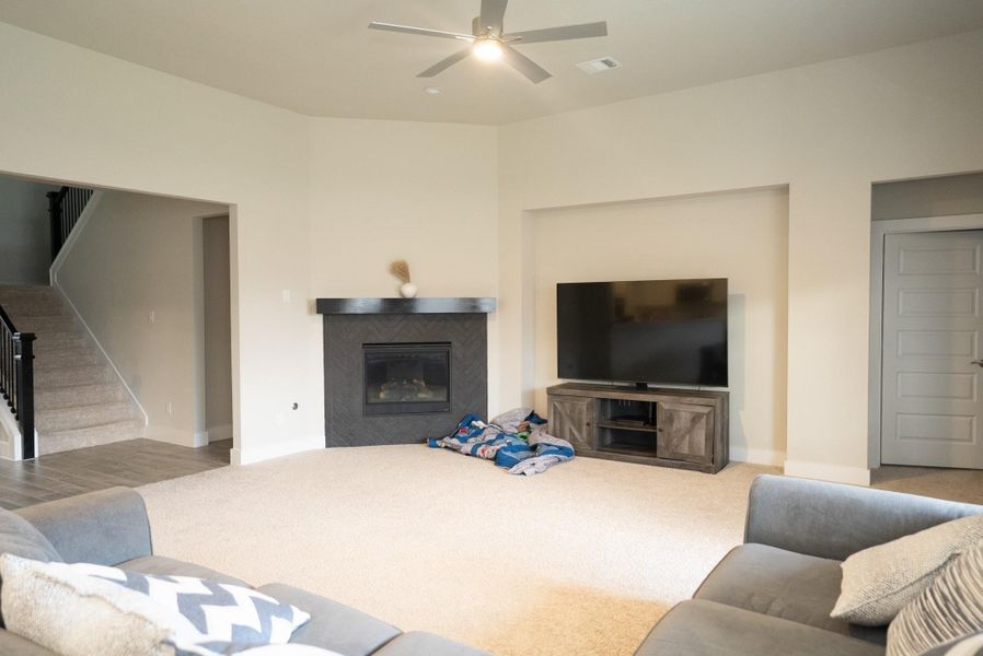 Furnished interior view inside a new home in Sunterra, Katy (Image 13).