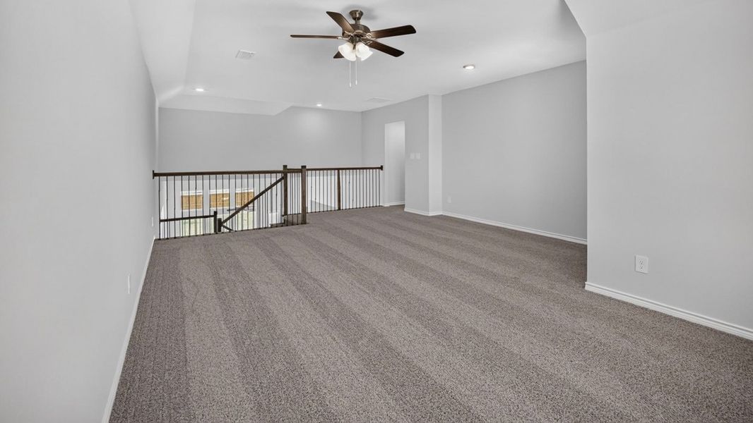 Representative unfurnished interior of a home built from the H233 Alpine by D.R. Horton in Lilybrooke at Legacy Hills, Celina (Image 13).