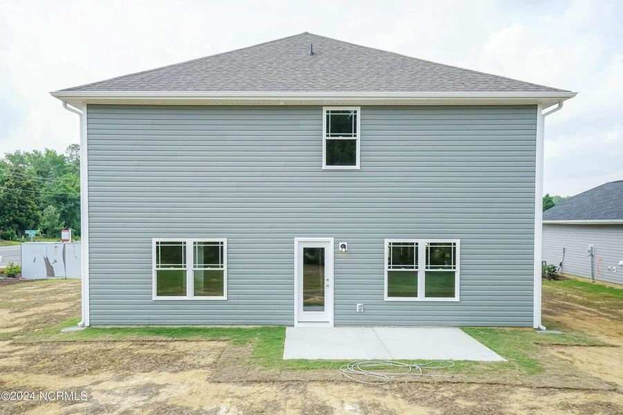 Front exterior of a new home in Waverly Place, Richlands, NC, highlighting curb appeal (Image 16).