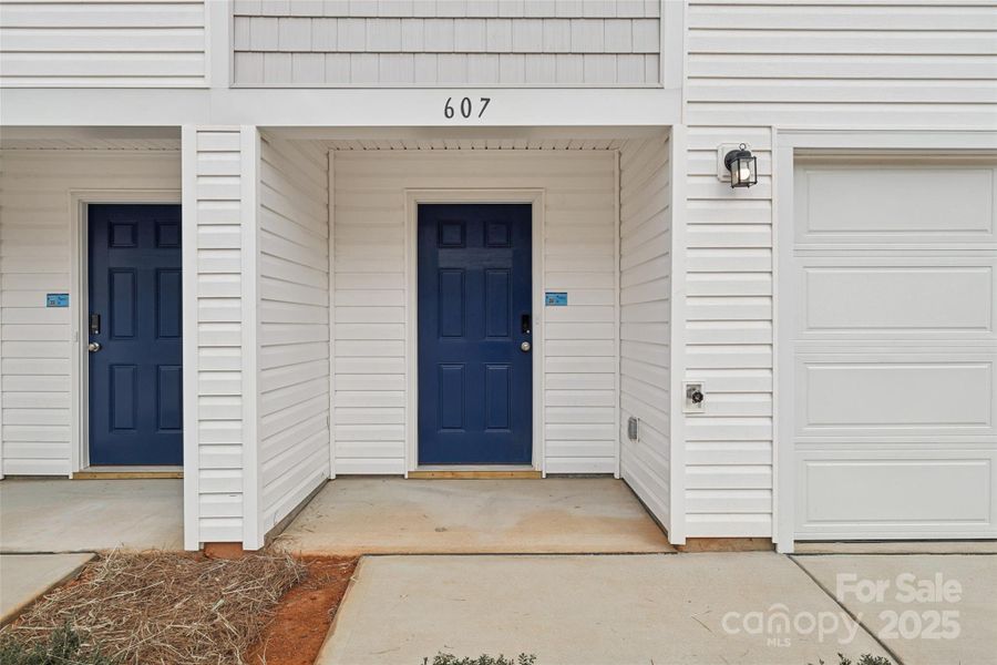 Exterior details and patio area of a home in The Towns at Green Needles, Lexington (Image 4).