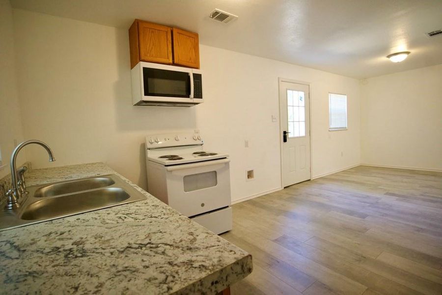 Furnished interior view inside a new home in , Log Cabin (Image 6). Furnished interior view inside a new home in , Log Cabin (Image 6).