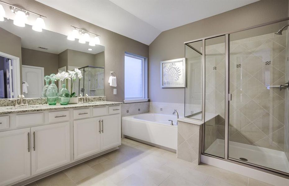 Luxurious owner's bath complete with double sinks and a generous shower *Model representation Luxurious owner's bath complete with double sinks and a generous shower *Model representation