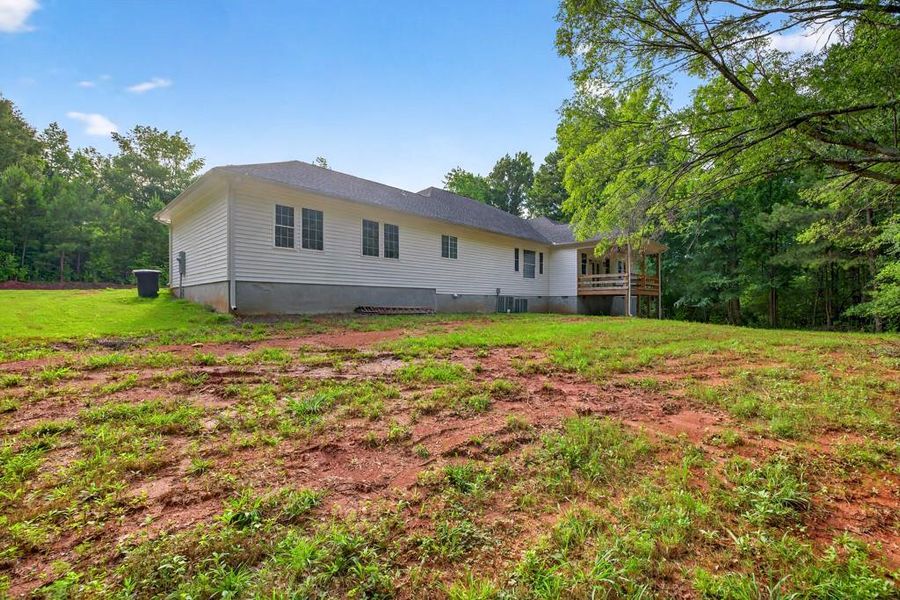 Front exterior of a new home in , Oxford, GA, highlighting curb appeal (Image 25). Front exterior of a new home in , Oxford, GA, highlighting curb appeal (Image 25).