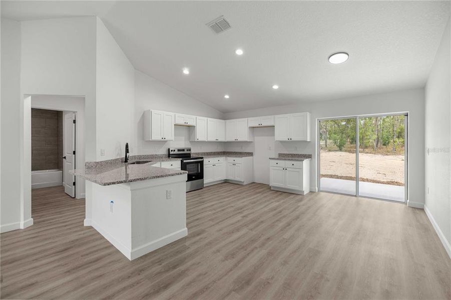 Furnished interior view inside a new home in , Dunnellon (Image 4).