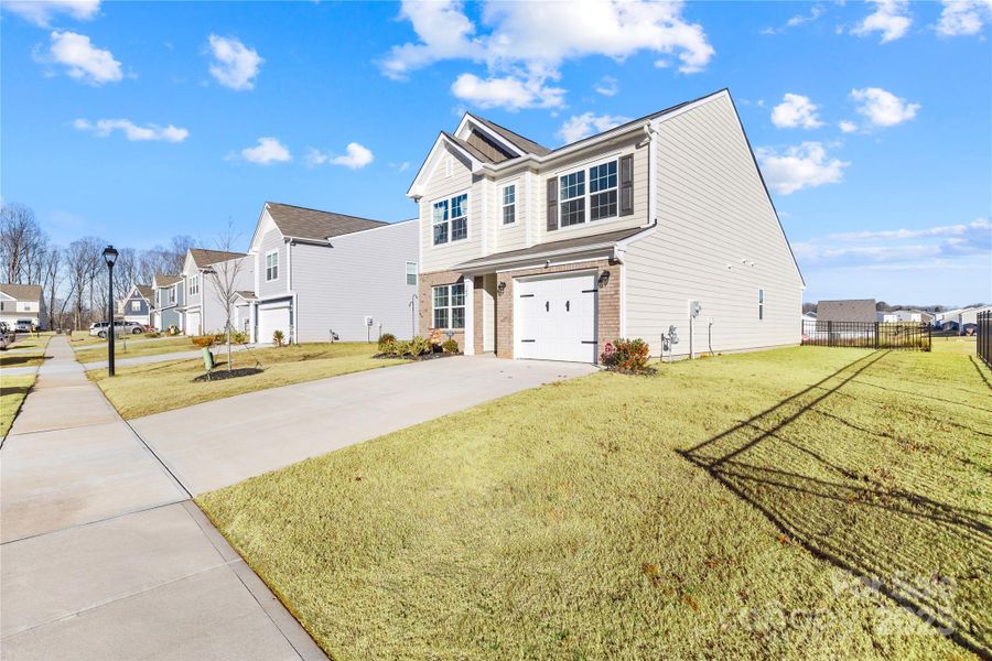 Exterior details and patio area of a home in , Statesville (Image 23).