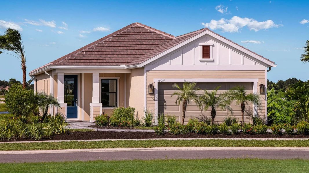 Representative exterior photo of a completed home built from the Imagination 2 by Neal Communities in Boca Royale Golf & Country Club Real Estate and Homes for Sale in Englewood, FL - Neal Communities, Englewood, FL (Image 1). Representative exterior photo of a completed home built from the Imagination 2 by Neal Communities in Boca Royale Golf & Country Club Real Estate and Homes for Sale in Englewood, FL - Neal Communities, Englewood, FL (Image 1).