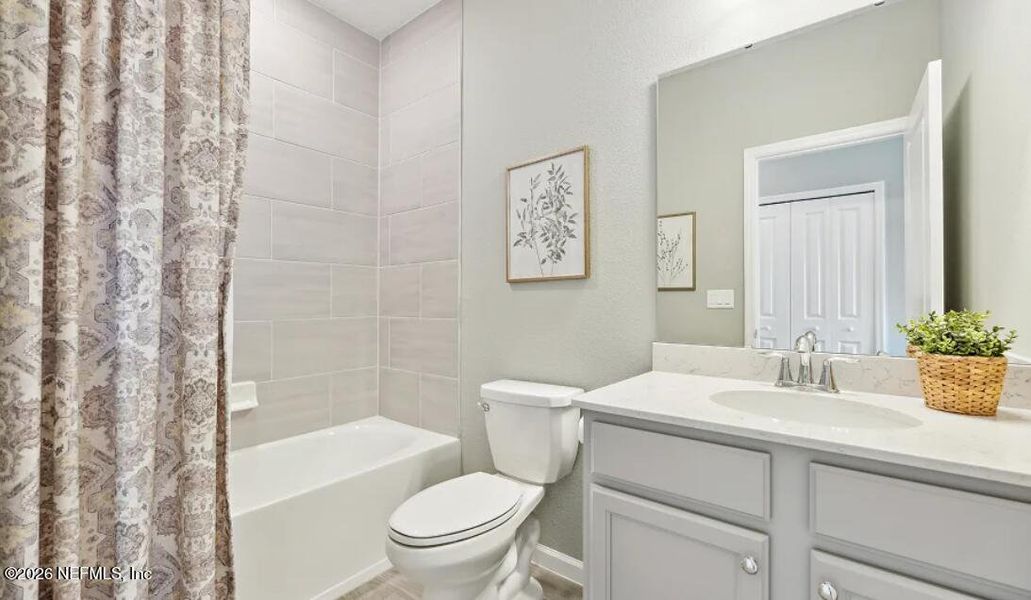 Furnished interior view inside a new home in Silver Falls Single Family at SilverLeaf, St. Augustine (Image 18).