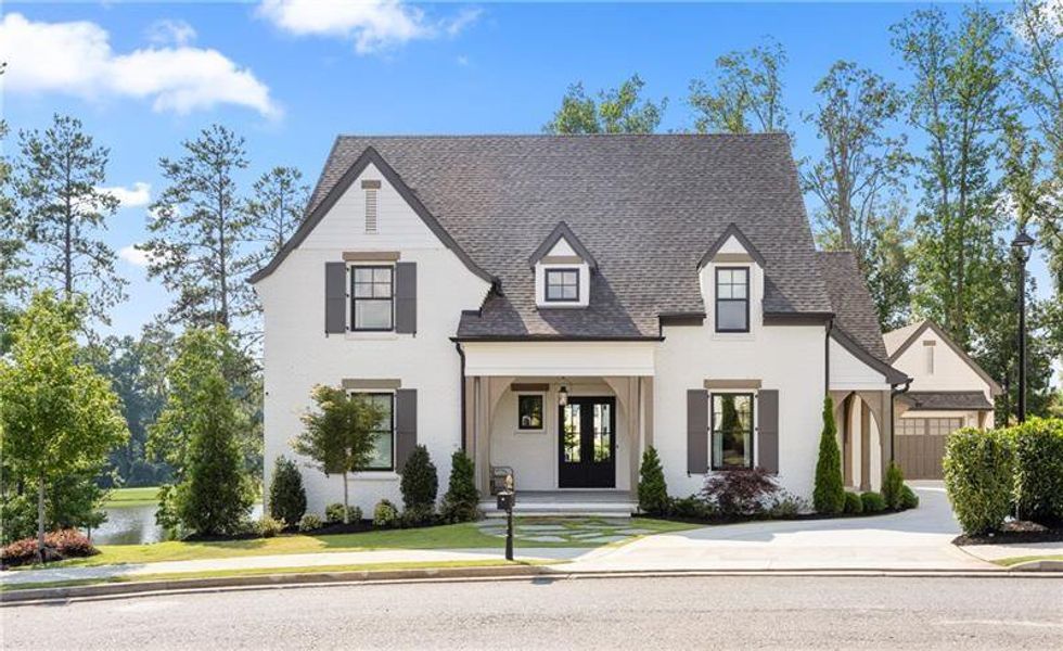 Front exterior of a new home in , Alpharetta, GA, highlighting curb appeal (Image 1).