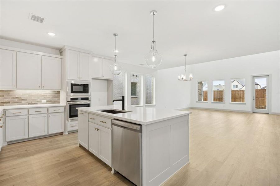 Packed with space, storage and style, this dream kitchen is calling your name! Packed with space, storage and style, this dream kitchen is calling your name!