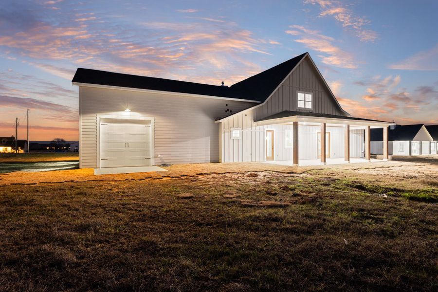 Exterior details and patio area of a home in , New Waverly (Image 28).