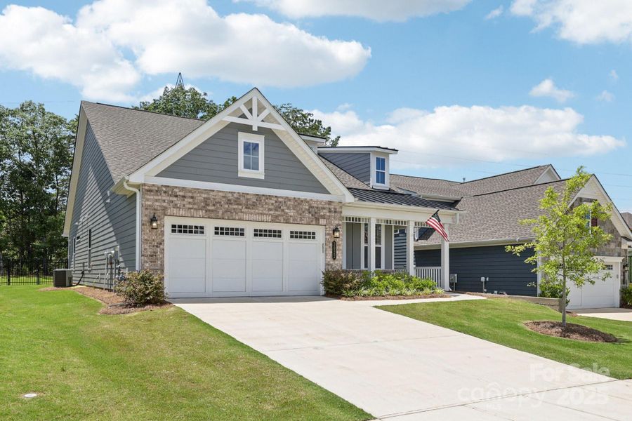 Front exterior of a new home in Handsmill on Lake Wylie, York, SC, highlighting curb appeal (Image 21).