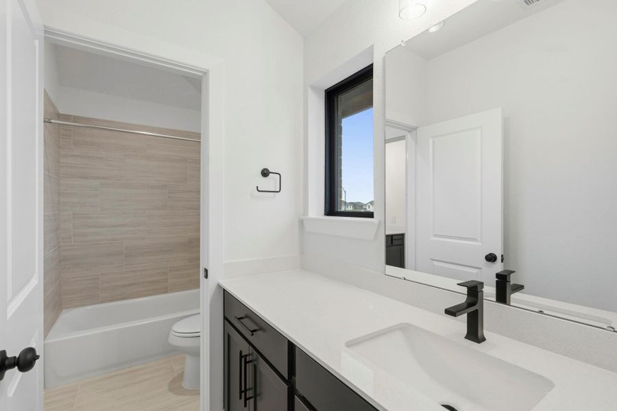 Furnished interior view inside a new home in Elyson, Katy (Image 8).
