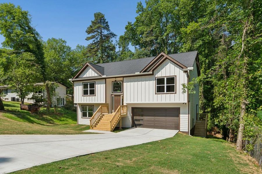 Front exterior of a new home in , Gainesville, GA, highlighting curb appeal (Image 22).