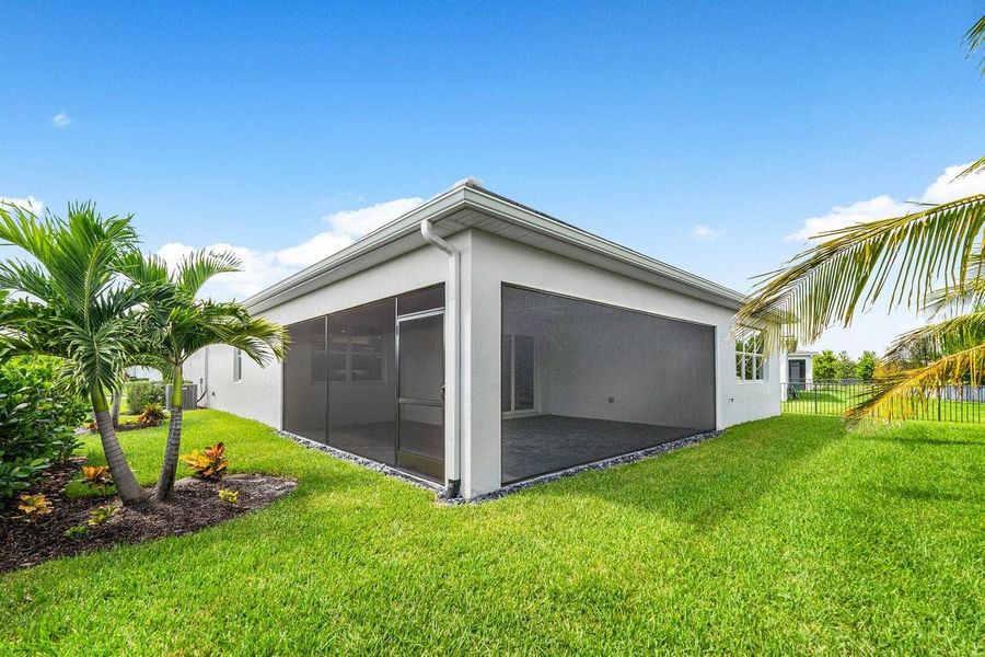 Front exterior of a new home in Tradition - Telaro, Port St. Lucie, FL, highlighting curb appeal (Image 1). Front exterior of a new home in Tradition - Telaro, Port St. Lucie, FL, highlighting curb appeal (Image 1).