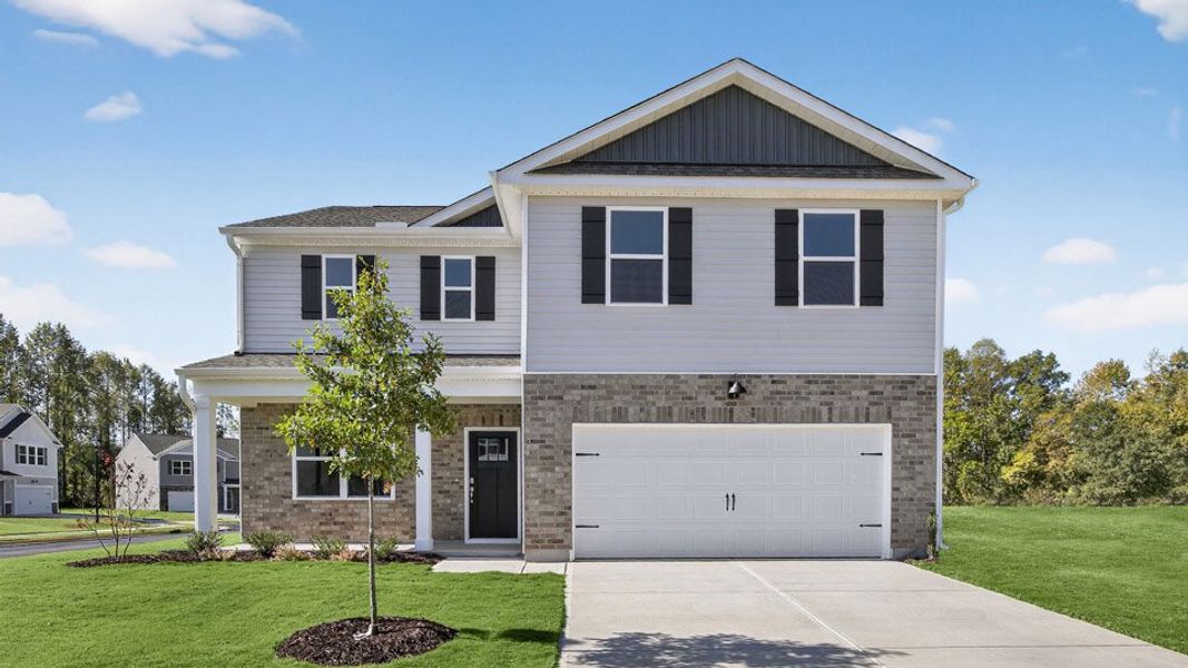 Front exterior of a new home in Martin Farms, Aberdeen, NC, highlighting curb appeal (Image 1). Front exterior of a new home in Martin Farms, Aberdeen, NC, highlighting curb appeal (Image 1).
