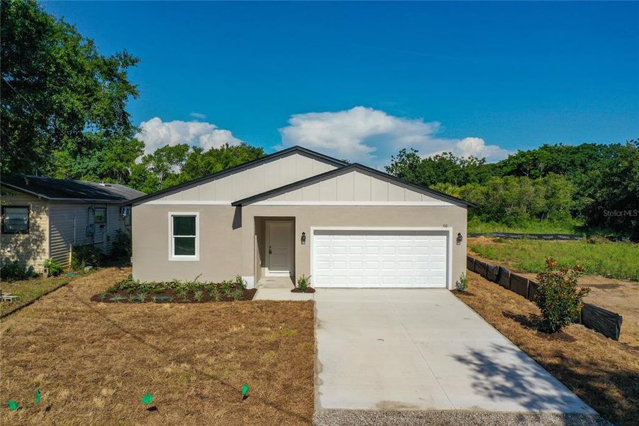 Front exterior of a new home in , Eustis, FL, highlighting curb appeal (Image 18). Front exterior of a new home in , Eustis, FL, highlighting curb appeal (Image 18).