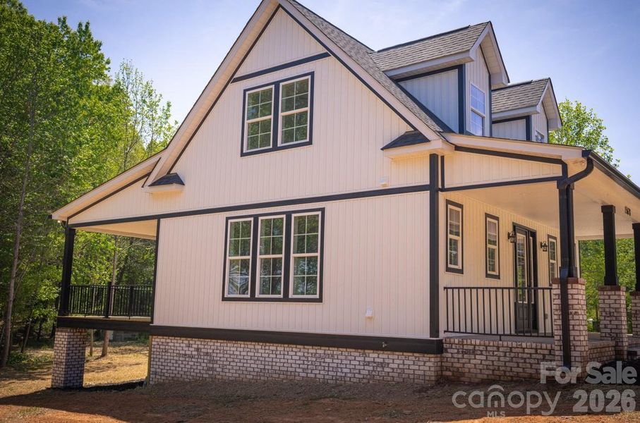Front exterior of a new home in , Oakboro, NC, highlighting curb appeal (Image 23).