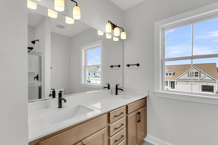 Furnished interior view inside a new home in Tidewater at Lakes of Cane Bay, Summerville (Image 12).