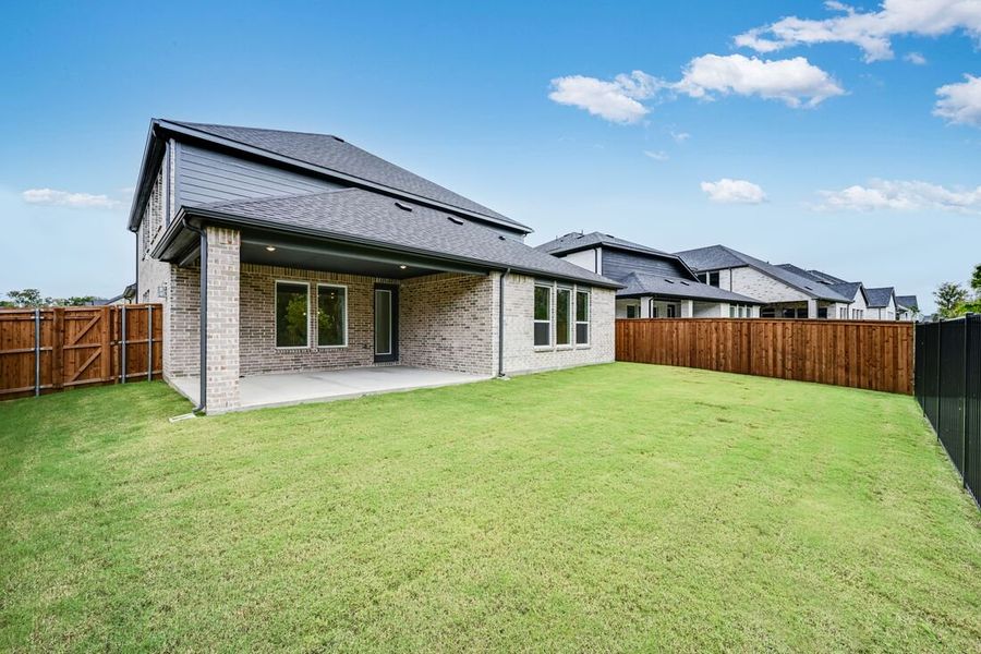 Exterior details and patio area of a home in Cross Creek Meadows 55s, Celina (Image 2). Exterior details and patio area of a home in Cross Creek Meadows 55s, Celina (Image 2).