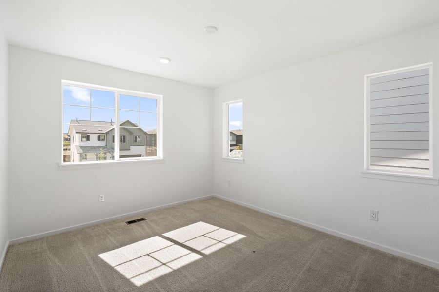 Spacious, unfurnished interior of a new home in Cordovan, Firestone (Image 10).